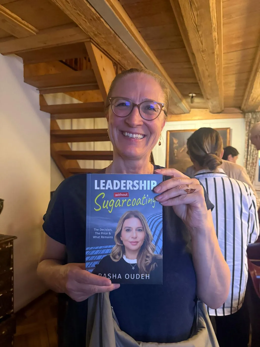 A guest with the book at a book evening