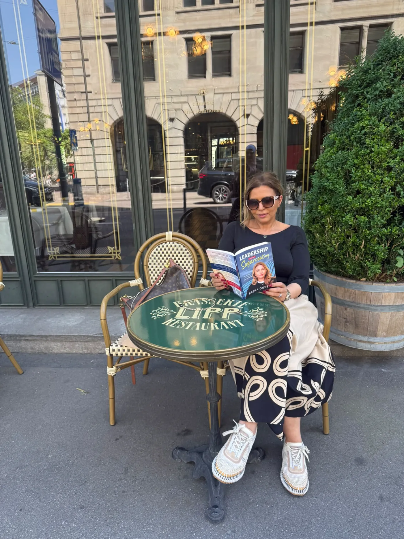 Rasha Oudeh reading her book at Brasserie Lipp