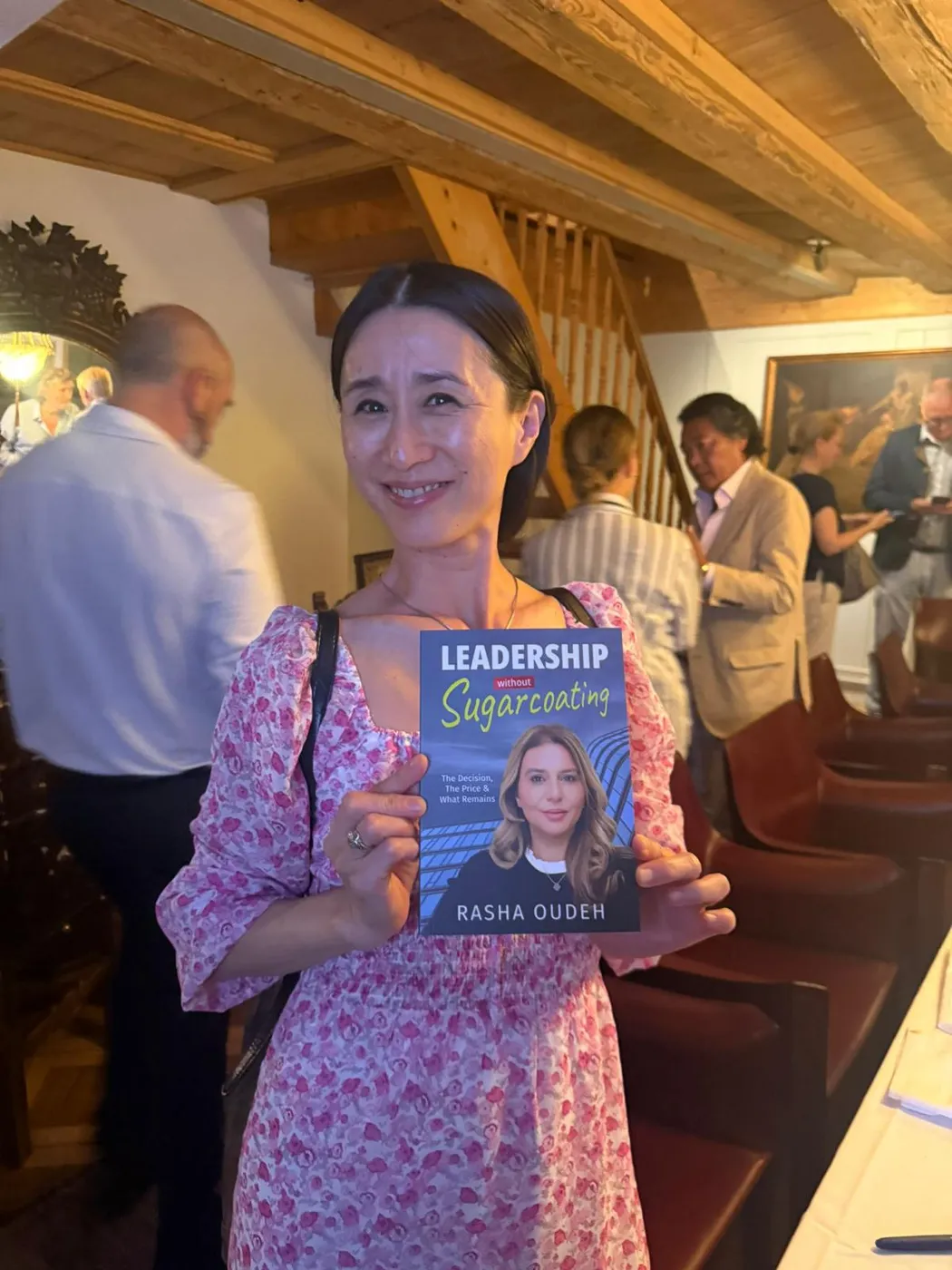 A guest with the book at a book evening