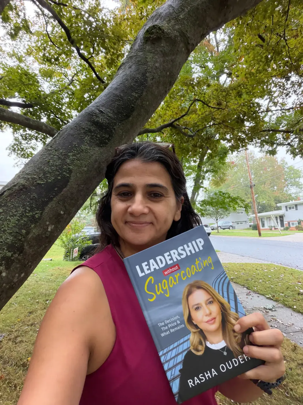 A reader with her copy of Leadership Without Sugarcoating